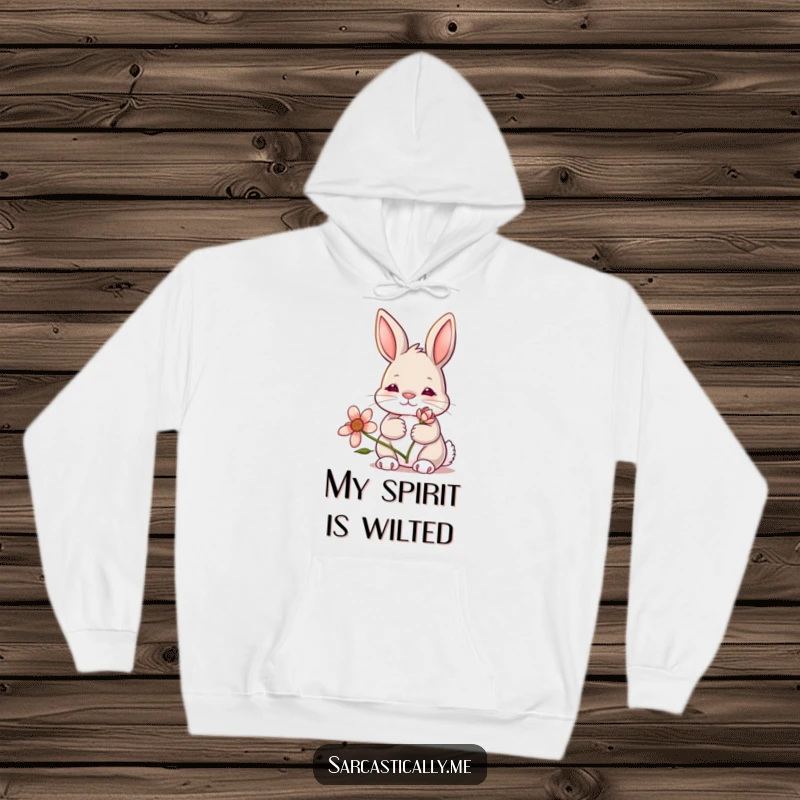 Funny bunny hoodie, showing a rabbit with a blank, deadpan expression holding a droopy wilting flower, perfect for cozy melancholy.
