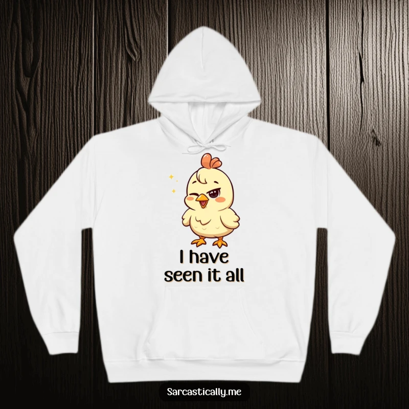 Funny chicken hoodie showcasing a happy chicken with a squinted eye looking unimpressed by a shiny object, perfect for cozy skepticism.